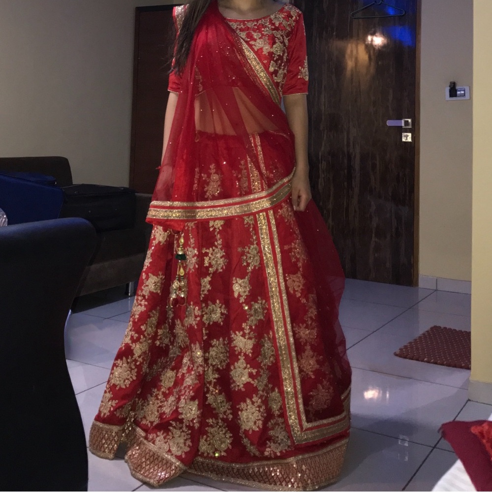 Red and gold Indian lehenga